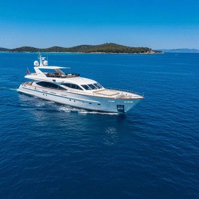 Luxury yacht sailing in the Mediterranean Sea with a clear blue sky