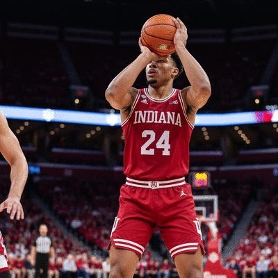 Eric Gordon playing basketball in an Indiana University uniform, mid-game action shot